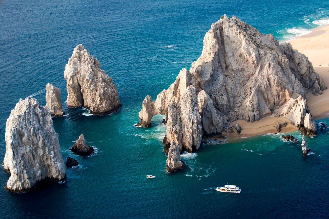 If you haven’t vacationed in Cabo before, you most likely have heard that it’s the go-to spot for most spring breakers. Many people aren’t aware that there are two Cabos: Cabo San Lucas and San José del Cabo united as Los Cabos Municipality. They are located on the southern tip of the Baja California Peninsula and are also known as “Land’s End”. Los Cabos are a different breed of Mexico which makes them even more special. Discover why vacationers spend the most time away from their resorts in Los Cabos.